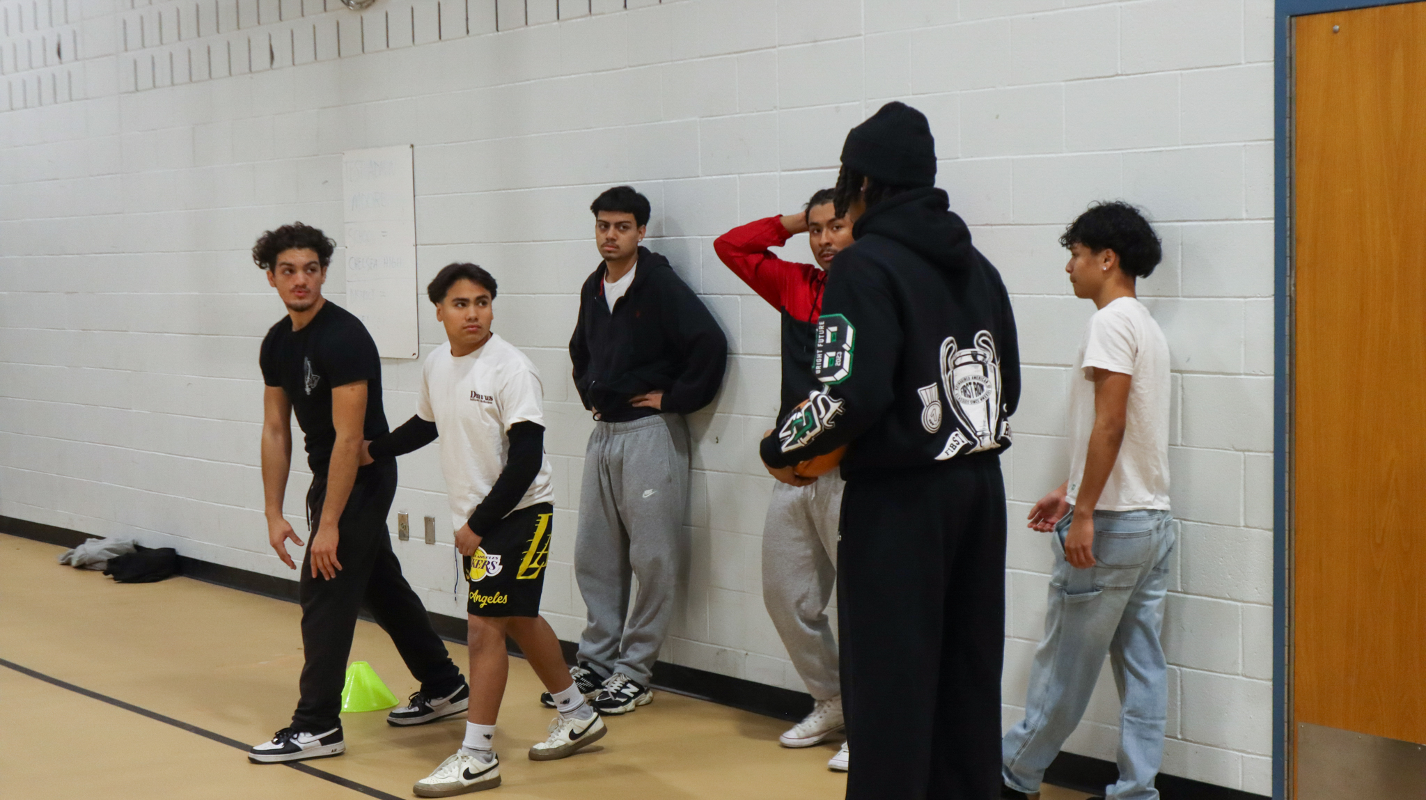 CHS football players listening to instructions and getting ready to start a drill 